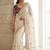White embellished embroidered sequinned sarees with blouse piece