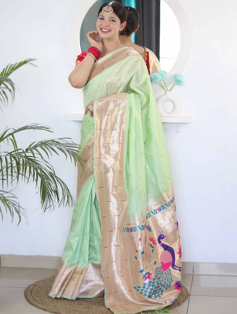 Green woven design zari paithani silk saree saree with unstitched blouse