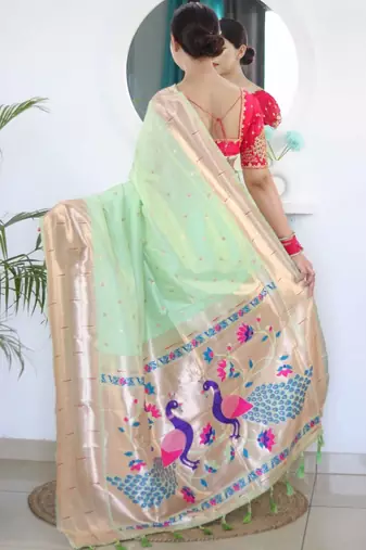 Green woven design zari paithani silk saree saree with unstitched blouse