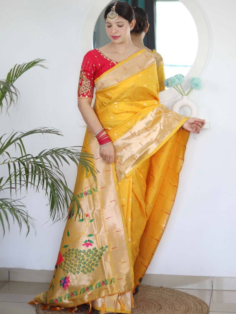 Yellow woven design zari paithani silk saree saree with unstitched blouse