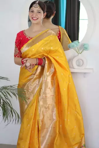 Yellow woven design zari paithani silk saree saree with unstitched blouse