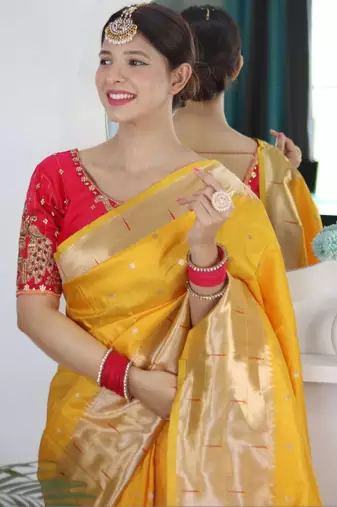 Yellow woven design zari paithani silk saree saree with unstitched blouse
