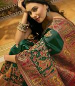 Green woven design saree with unstitched blouse