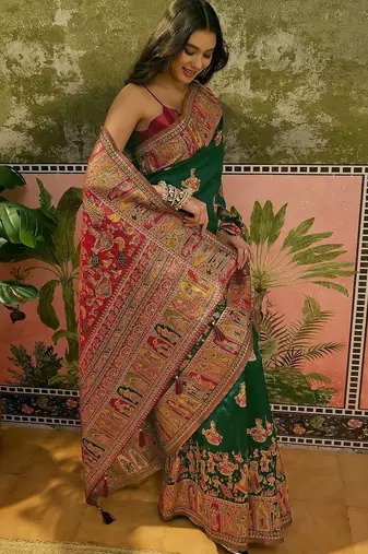 Green woven design saree with unstitched blouse