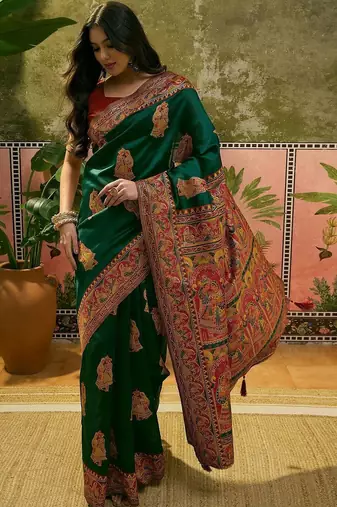Green woven design saree with unstitched blouse