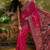 Pink woven design saree with unstitched blouse