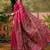 Pink woven design saree with unstitched blouse