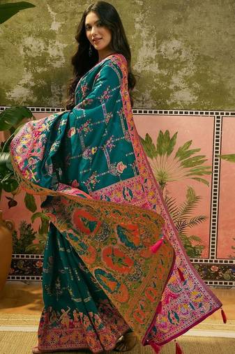 Green woven design saree with unstitched blouse