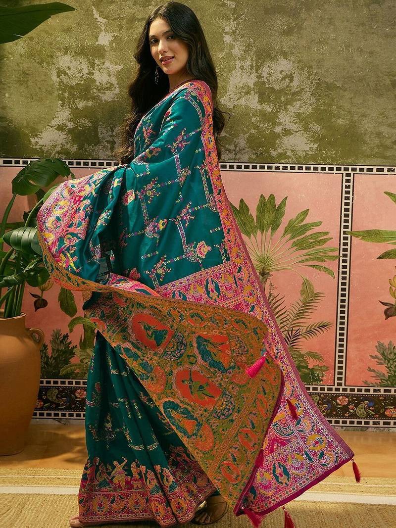 Green woven design saree with unstitched blouse
