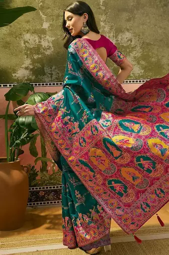 Green woven design saree with unstitched blouse
