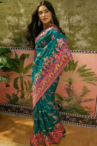 Green woven design saree with unstitched blouse