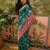 Green woven design saree with unstitched blouse