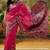 Pink woven design saree with unstitched blouse