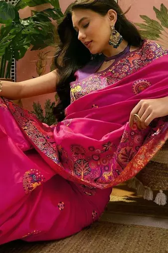 Pink woven design saree with unstitched blouse