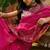 Pink woven design saree with unstitched blouse