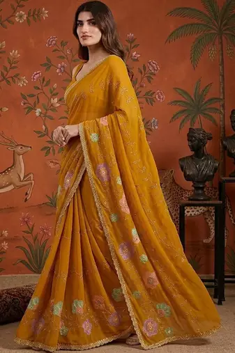 Mustard embellished embroidered  georgette saree