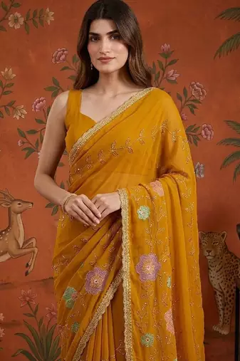 Mustard embellished embroidered  georgette saree