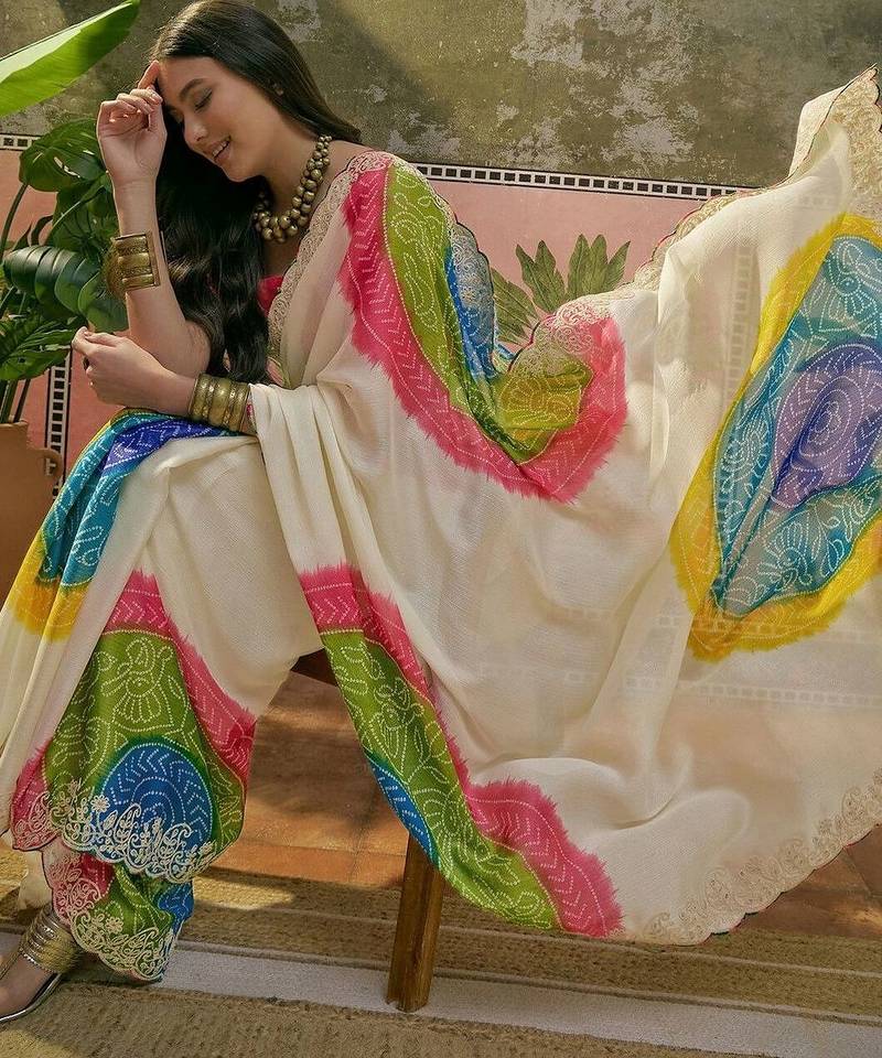 Off white bandhani printed  chiffon saree with embellished border & blouse piece