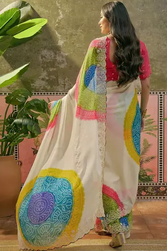 Off white bandhani printed  chiffon saree with embellished border & blouse piece