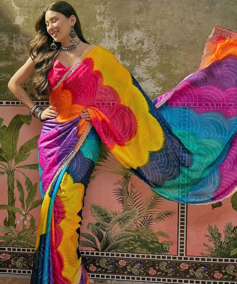 Yellow bandhani printed saree with embellished border and blouse piece