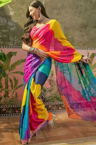 Yellow bandhani printed saree with embellished border and blouse piece