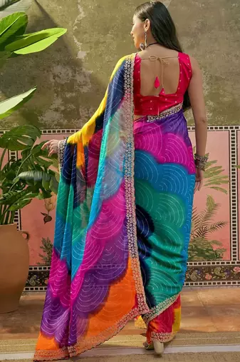 Yellow bandhani printed saree with embellished border and blouse piece