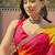 Yellow bandhani printed saree with embellished border and blouse piece