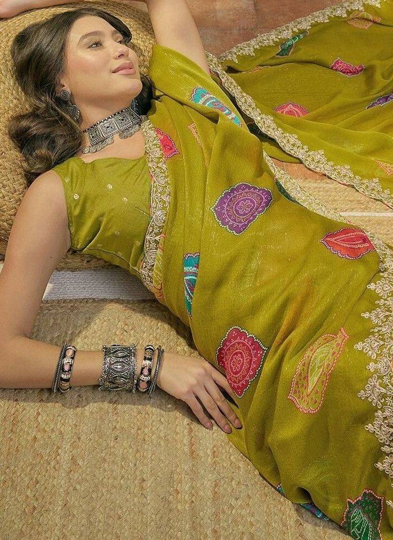 Green bandhani printed  chiffon saree with embroidered border and blouse piece