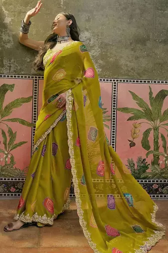 Green bandhani printed  chiffon saree with embroidered border and blouse piece