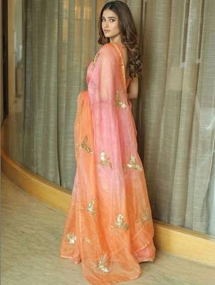 Peach women ethnic motifs embellished sequinned satin saree 3
