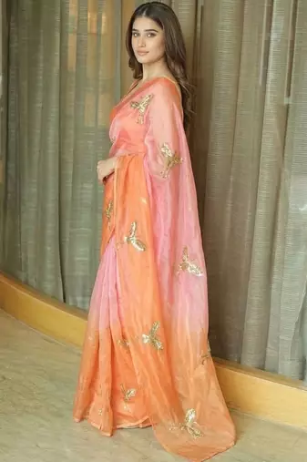 Peach women ethnic motifs embellished sequinned satin saree