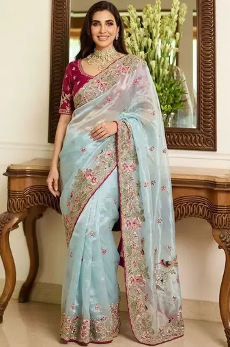 Turquoise embroidered sarees with unstitched blouse piece