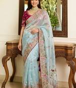 Turquoise embroidered sarees with unstitched blouse piece