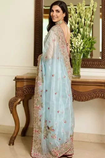 Turquoise embroidered sarees with unstitched blouse piece