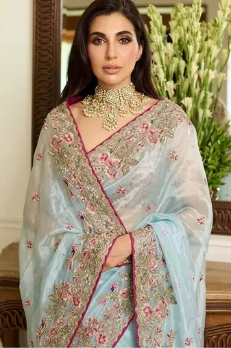 Turquoise embroidered sarees with unstitched blouse piece