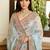 Turquoise embroidered sarees with unstitched blouse piece