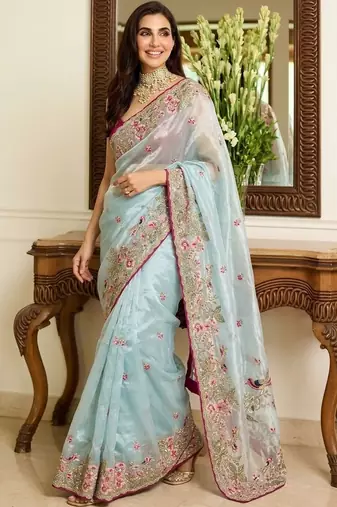 Turquoise embroidered sarees with unstitched blouse piece
