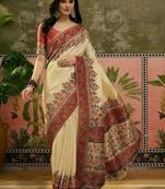 Off white position printed zari weaving saree with contrast blouse piece