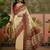 Off white position printed zari weaving saree with contrast blouse piece
