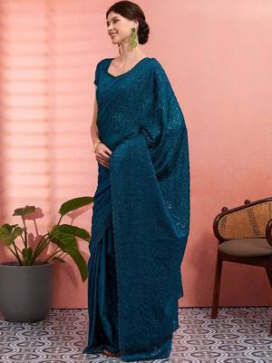 Teal ethnic embroidered festive wear saree with matching blouse 5
