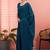 Teal ethnic embroidered festive wear saree with matching blouse