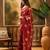 Maroon woven design banarasi saree with blouse piece