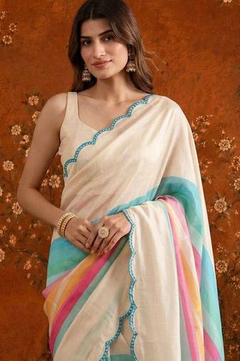 Off white striped mirror work satin saree