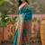 Teal position printed zari weaving saree with contrast blouse piece