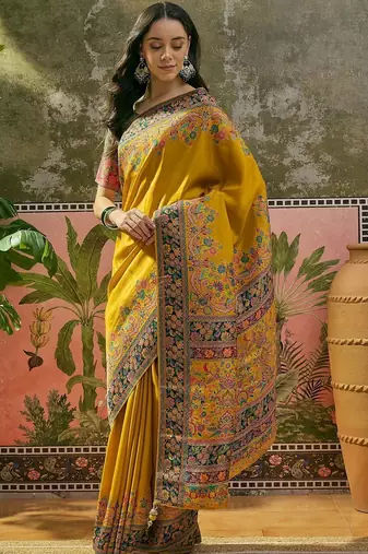 Mustard position printed zari weaving saree with contrast blouse piece