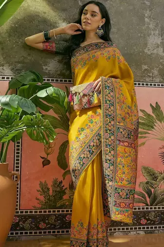 Mustard position printed zari weaving saree with contrast blouse piece