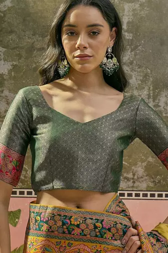 Mustard position printed zari weaving saree with contrast blouse piece