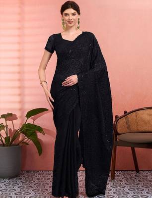 Black ethnic embroidered festive wear saree with matching blouse 1