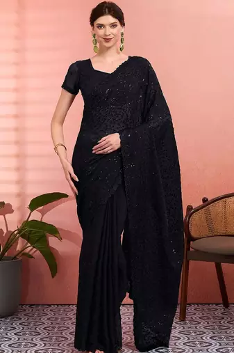 Black ethnic embroidered festive wear saree with matching blouse