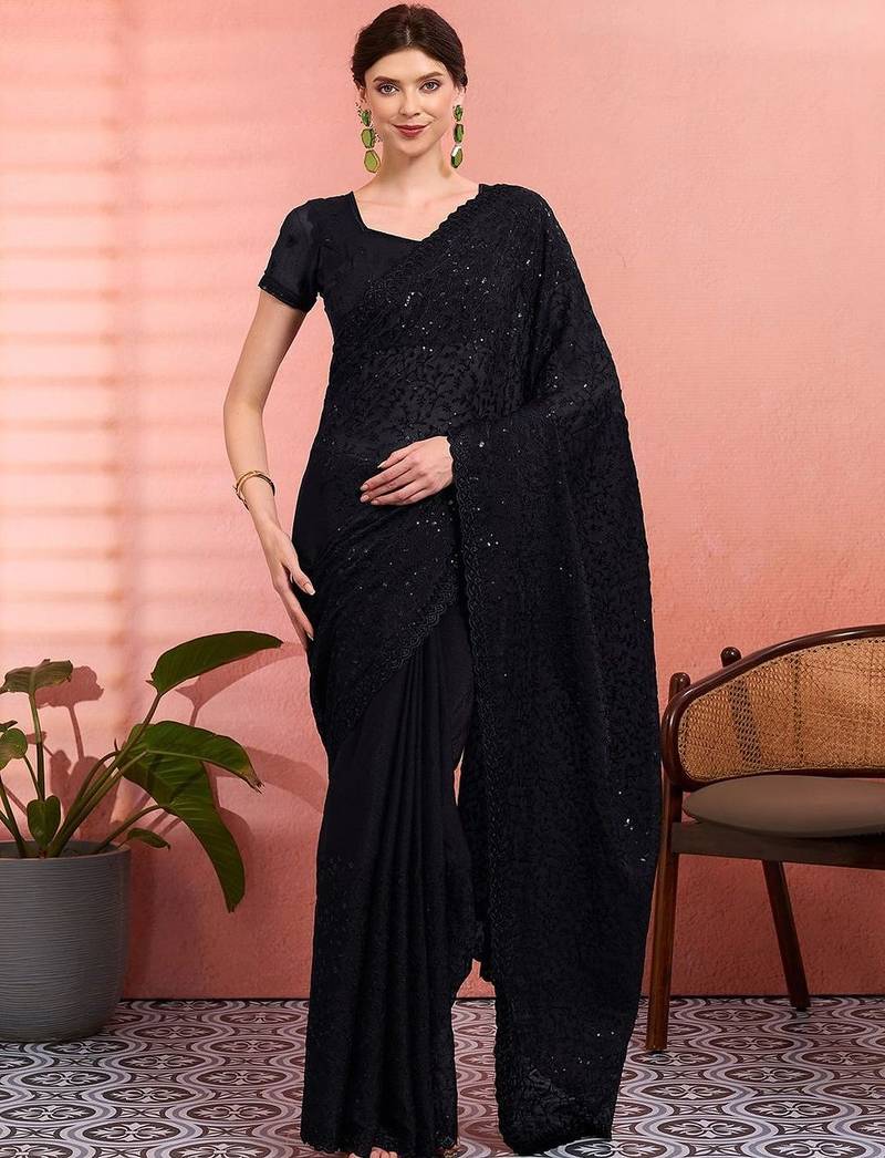 Black ethnic embroidered festive wear saree with matching blouse